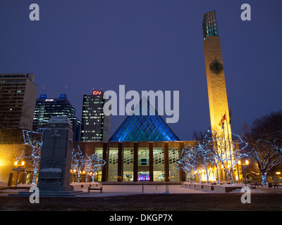 A night view of Edmonton City Hall, Sir Winston Churchill Square, and downtown Edmonton in winter.  Edmonton, Alberta, Canada. Stock Photo