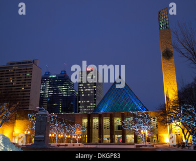 A night view of Edmonton City Hall, with the new EPCOR tower and CN Tower (Edmonton) in the background.  Edmonton, Alberta. Stock Photo