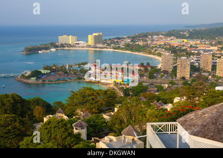 Elevated view over city and coastline, Ocho Rios, Jamaica, West Indies, Caribbean, Central America Stock Photo