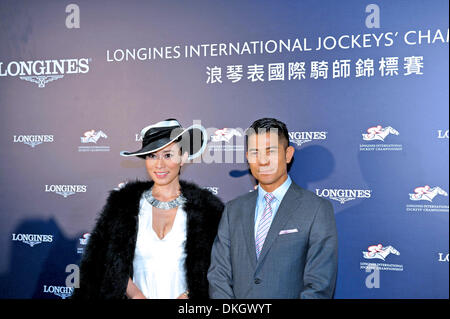 Hong Kong, China. 5th Dec, 2013. Actress Charmaine Sheh and actor Aaron Kwok attend press conference of Longines International Jockey`s Championship in Hong Kong, China on Thursday December 5, 2013. © TopPhoto/Alamy Live News Stock Photo