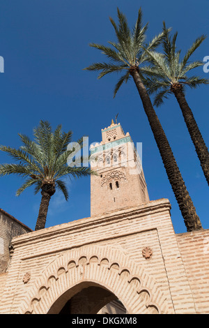Gateway and the Minaret of Koutoubia Mosque with palm trees, UNESCO Site, Marrakech, Morocco, North Africa, Africa Stock Photo