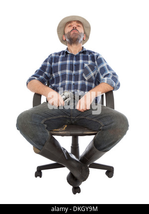 dangerous man with gun sit on leather chair Stock Photo