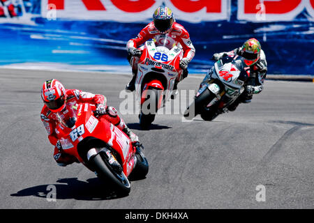 July 03, 2009 - Monterey, California, USA - 03 July 2009: Nicky Hayden, of USA, rides the #69 motorcycle for the Ducati Team, Niccolo Canepa, of Italy, rides the #88 Ducati for the Pramac Team, and Gabor Talmacsi, of Hungary, rides the #41 Honda motorcycle for the Scot Racing Team MotoGP during MotoGP practice at the  Mazda Raceway Laguna Seca, in Monterey, Calif. MotoGP's 8th race Stock Photo