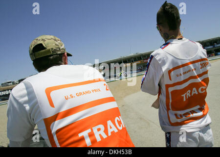 July 04, 2009 - Monterey, California, U.S - 04 July 2009: Track workers look on during MotoGP qualifying at the  Mazda Raceway Laguna Seca, in Monterey, Calif. MotoGP's 8th race is set to take place on Sunday, July 5, 2009 prior to making its next stop  in Germany. (Credit Image: © Konsta Goumenidis/Southcreek Global/ZUMApress.com) Stock Photo