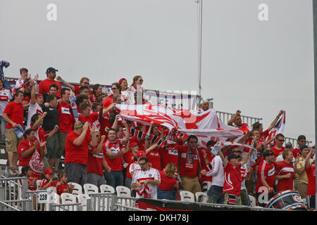 16 August 2009: Chicago Fire supporters' cheer after a first half goal by Chris Rolfe in the thirteenth minute to go up 1-0. The Chicago Fire went on to defeat the Kansas City Wizards 2-0 at CommunityAmerica Ballpark in Kansas City, KS. (Credit Image: © Tyson Hofsommer/Southcreek Global/ZUMApress.com) Stock Photo