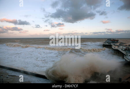 Cromer, Norfolk, UK. 6th December 2013. Waters from a spring high tide at 8.30am inundate the pier at Cromer in Norfolk UK in the strongest storm surge seen since 1953 Credit:  Tim James/The Gray Gallery/Alamy Live News Stock Photo