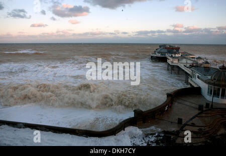 Cromer, Norfolk, UK. 6th December 2013. Waters from a spring high tide at 8.30am inundate the pier at Cromer in Norfolk UK in the strongest storm surge seen since 1953 Credit:  Tim James/The Gray Gallery/Alamy Live News Stock Photo