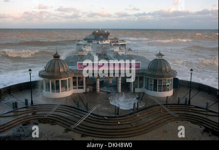 Cromer, Norfolk, UK. 6th December 2013. Waters from a spring high tide at 8.30am inundate the pier at Cromer in Norfolk UK in the strongest storm surge seen since 1953 Credit:  Tim James/The Gray Gallery/Alamy Live News Stock Photo