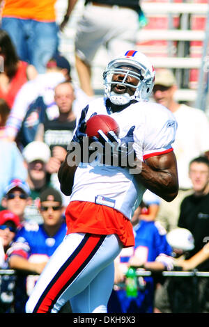 Buffalo Bills widereciever Terrell Owens is all smiles as he models the throwback  jersey for the 50th season celebration durring Thursday nights practice at  St. John Fisher College in Rochester, NY (Credit