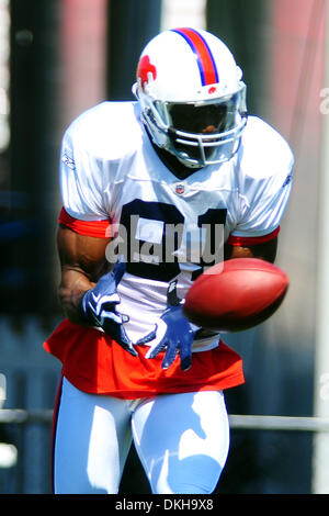 30 July 2009: Wide Reciever Terrell Owens of the Buffalo Bills unveils the  new throwback uniforms after the Bills Thursday night practice at St. John  Fisher College in Pittsford, New York. (Icon