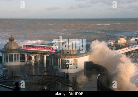 Cromer, Norfolk, UK. 6th December 2013. Waters from a spring high tide at 8.30am inundate the pier at Cromer in Norfolk UK in the strongest storm surge seen since 195 Credit: © Tim James/The Gray Gallery/Alamy Live News  Stock Photo