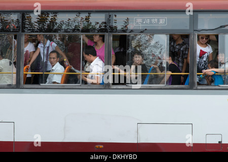 People travelling in bus, Xi'an, Shaanxi, China. Stock Photo