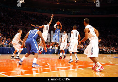 Dec. 09, 2009 - NEW YORK, Kentucky, USA - John Wall scored on a jumper as UConn's 21- Stanley Robinson tried to defend as the University of Kentucky (UK) played the the University of Connecticut (UConn) in the SEC-Big East Invitational at Madison Square Garden in New York, NY, Wednesday, December, 9, 2009. This is second half action. UK won 64-61. Photo by Charles Bertram | Staff   Stock Photo