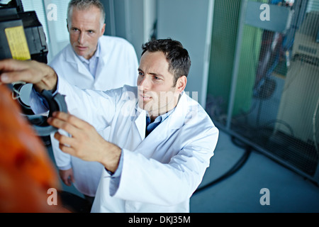 Scientists working in laboratory Stock Photo