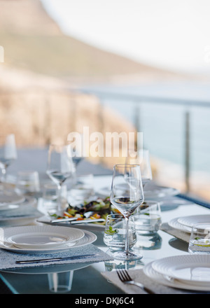 Set table on luxury patio Stock Photo