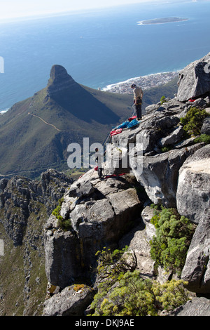 Two climbers abseiling on Table Mountain, Cape Town. Stock Photo