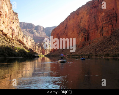Two rafts in a calm stretch of the Redwall section of the Grand Canyon. Stock Photo