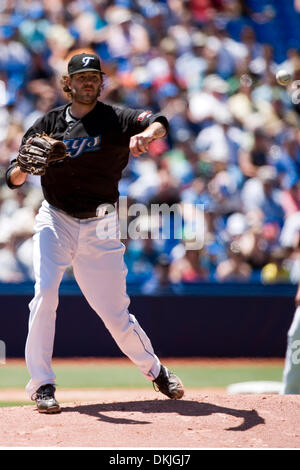 June 14, 2009 - Toronto, Ontario, Canada - 14 June 2009: Blue Jays starting left handed pitcher Brian Tallet (56) throws to first in the third inning of play at the Rogers Center in Toronto, Canada. (Credit Image: © Southcreek Global/ZUMApress.com) Stock Photo