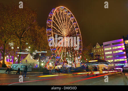 London, UK. 6th December 2013. Lights of a Giant Ferris Wheel and Funfair in Leicester Square for Christmas, London, England Credit:  Paul Brown/Alamy Live News Stock Photo