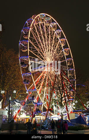 London, UK. 6th December 2013. Lights of a Giant Ferris Wheel and Funfair in Leicester Square for Christmas, London, England Credit:  Paul Brown/Alamy Live News Stock Photo