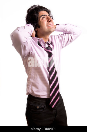 Young stressed out Indian business man Stock Photo