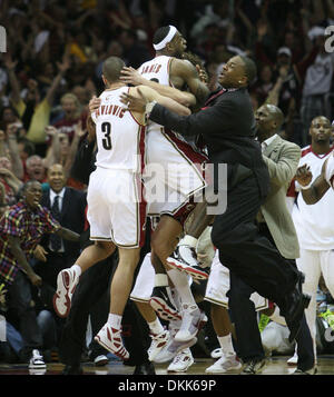 The Cleveland Cavaliers' LeBron James (23) is fouled by the fallen ...