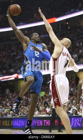 May 22, 2009 - Cleveland, Ohio, U.S. - Orlando center DWIGHT HOWARD (12) shoots over Cleveland center ZYDRUNAS ILGAUSKAS (11) during the first half of the Magic's game against the Cleveland Cavaliers in game two of the Easter Conference Finals at Quicken Loans Arena. (Credit Image: © Gary W. Green/Orlando Sentinel/ZUMAPRESS.com) Stock Photo