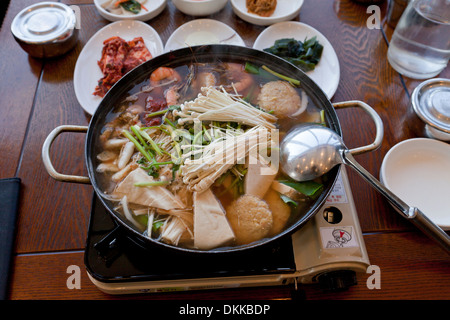 Spicy seafood soup dish (Haemultang) on table - South Korea Stock Photo