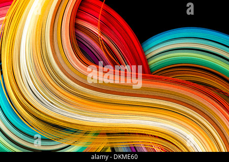 Paper strips in rainbow colors as a colorful backdrop Stock Photo