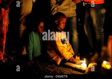 JOHANNESBURG, SOUTH AFRICA: People gathering in Houghton on December 6, 2013, in Johannesburg, South Africa. The Father of the Nation, Nelson Mandela, Tata Madiba, passed away quietly on the evening of December 5, 2013 at his home in Houghton with family. (Photo by Gallo Images / The Times / Alon Skuy) Stock Photo