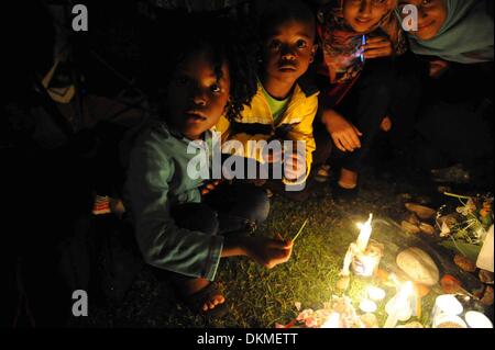 JOHANNESBURG, SOUTH AFRICA: People gathering in Houghton on December 6, 2013, in Johannesburg, South Africa. The Father of the Nation, Nelson Mandela, Tata Madiba, passed away quietly on the evening of December 5, 2013 at his home in Houghton with family. (Photo by Gallo Images / The Times / Alon Skuy) Stock Photo