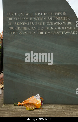 Flowers laid at the Clapham Junction rail disaster memorial mark the 25th anniversary of the accident on December 13 Stock Photo