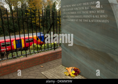 Flowers laid at the Clapham Junction rail disaster memorial mark the 25th anniversary of the accident on December 13 Stock Photo