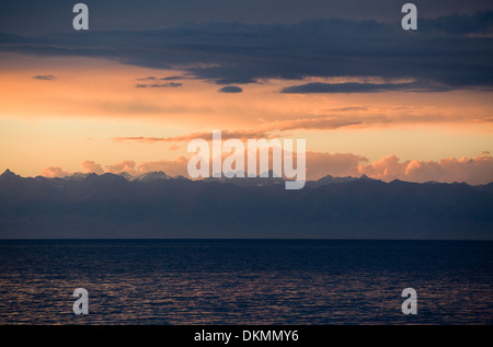 Issyk-Kyl lake at sunset Stock Photo