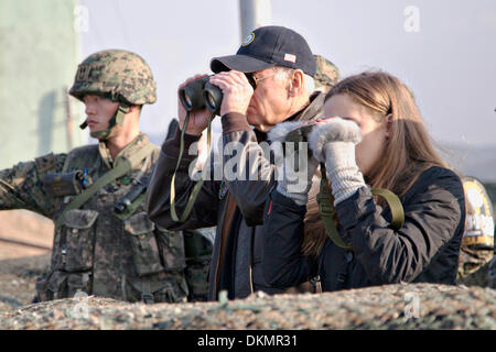 US Vice President Joe Biden and granddaughter Finnegan Biden look over into North Korea at Observation Point Ouelette December 7, 2013 near Wonju, South Korea. Stock Photo