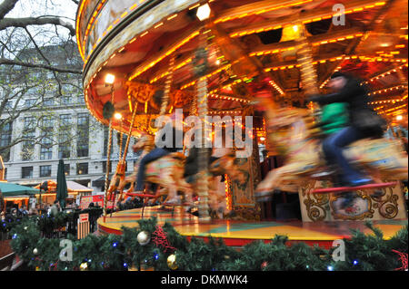 Leicester Square, London, UK. 7th December 2013. A Carousel at the Leicester Square Christmas funfair. Credit:  Matthew Chattle/Alamy Live News Stock Photo