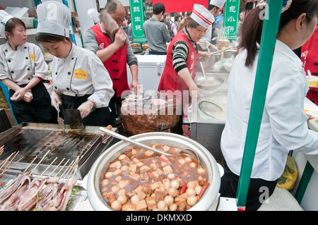 Street food area in Yuyuan Tourist Mart near Yuyuan Garden, Old City, Huangpu District, Shanghai, China Stock Photo