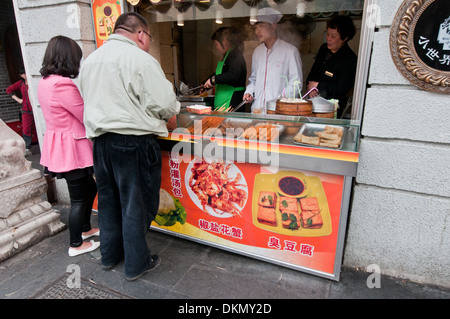 Street food area in Yuyuan Tourist Mart near Yuyuan Garden, Old City, Huangpu District, Shanghai, China Stock Photo