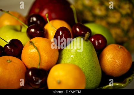 Selection of fresh fruits in a container Stock Photo