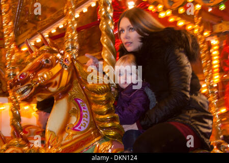 London December 7th 2013. Fun on the Victorian carousel at the funfair in the West end's Leicester square. Credit:  Paul Davey/Alamy Live News Stock Photo