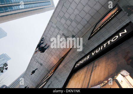 Louis Vuitton shop in Plaza 66 commercial and office complex at West Nanjing Road - famous shopping street in Shanghai, China Stock Photo