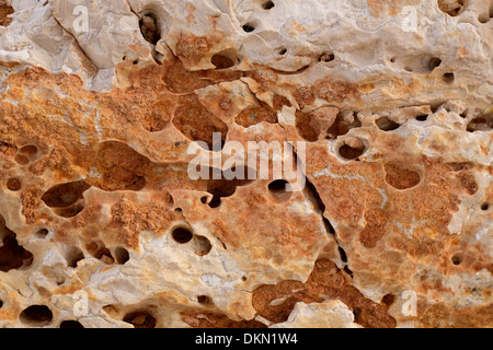 eroded weathered limestone in Mediterranean shoreline at Spain Stock Photo