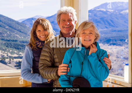 Sister, brother and friend on Tenderfoot Mountain, above Salida, Colorado, USA Stock Photo