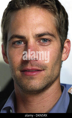 November 30, 2013 - File - PAUL WALKER, an actor perhaps best known for his roles in the 'Fast and Furious' films died in a fiery car crash. He was 40 years old. Los Angeles County Sheriff found a car engulfed in flames when they responded to a report of a collision in the community of Valencia. Two people who were found in the car were pronounced dead at the scene. Walker was the passenger in a friend's car. Pictured: Portrait shoot miami 2005. (Credit Image: © David Jacobs/ZUMA Wire/ZUMAPRESS.com) Stock Photo