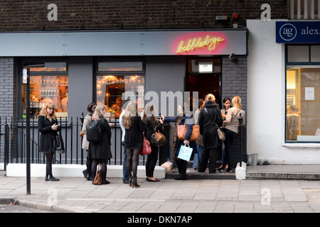Queues outside the fashionable London restaurant Bubbledogs Stock Photo