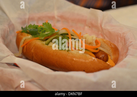 Hotdogs at fashionable London restaurant Bubbledogs that pairs hotdogs with champagne. Stock Photo