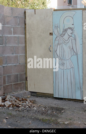 portrait on a board of a boarded off back yard. Stock Photo