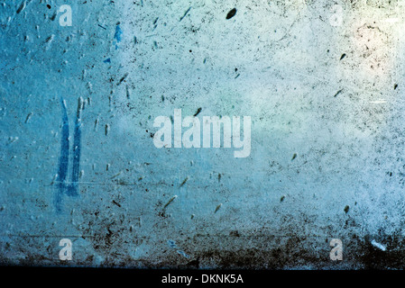 Dirty glass window, image is suitable as a background for your design. Stock Photo