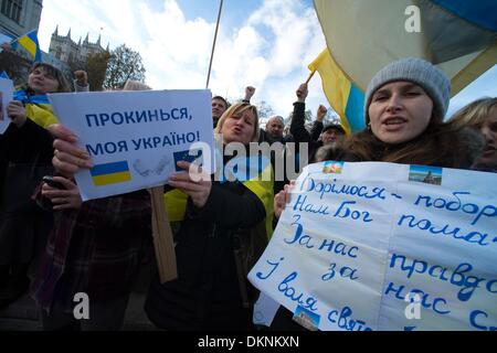 London, UK. 8th Dec, 2013. London Ukrainians and supporters protest against Putin and rally for EU deal in Parliament Square. Credit:  Gail Orenstein/ZUMAPRESS.com/Alamy Live News Stock Photo