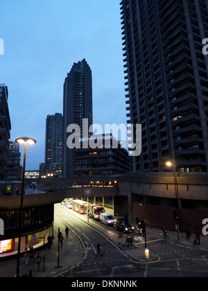 A view of the Barbican residential towers above a lit up Beech Street underpass tunnel with traffic Central London KATHY DEWITT Stock Photo